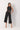 Calça culotte feminina da Ferrache com pregas frontais e bolsos envelope