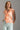 Camisola feminina Ferrache com decote em V e folhos frontais.