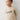 Sweatshirt bege Mayoral para menino com estampado frontal e punhos às riscas.
