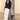 Calça feminina wide leg Scusi de cintura subida com perna larga e bolsos frontais.