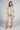 Calça Silvina Campos bege com bordado na bainha e corte direito