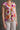 Túnica Silvina Campos floral colorida com decote em V e folho.