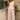 Calça feminina wide leg da Ferrache com cintura subida e botões dourados